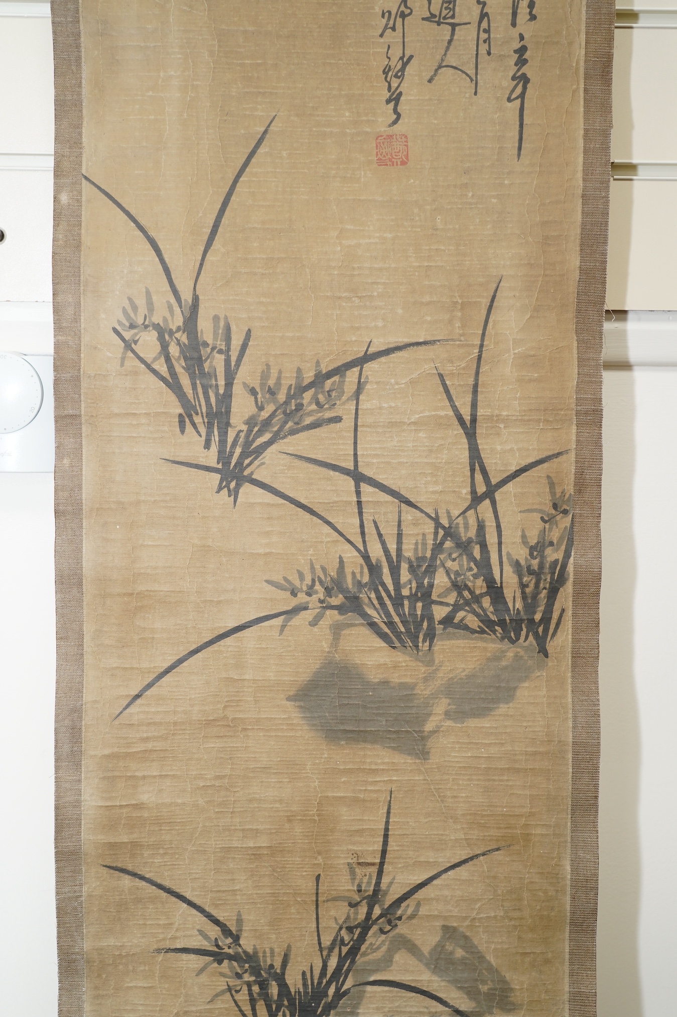 Chinese School, a set of four scroll paintings on paper of plum, orchid, bamboo and chrysanthemum, boxed. Condition - fair to good
